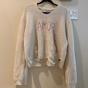 Cute, “ripped” sweater